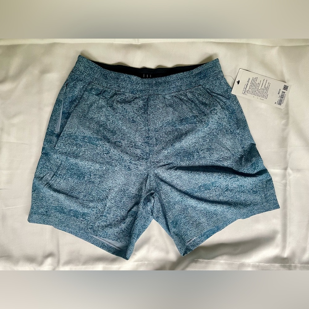Cool textured blue Lululemon Pace Breaker men’s 7” athletic shorts